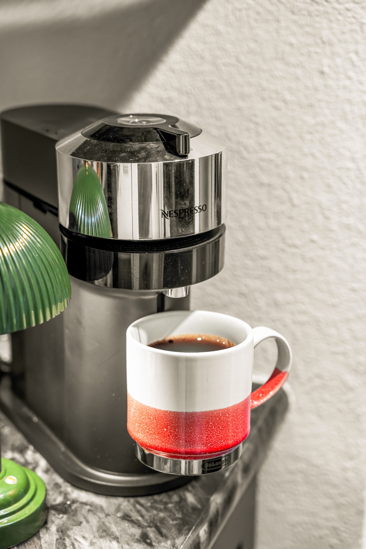 Nespresso machine brewing coffee