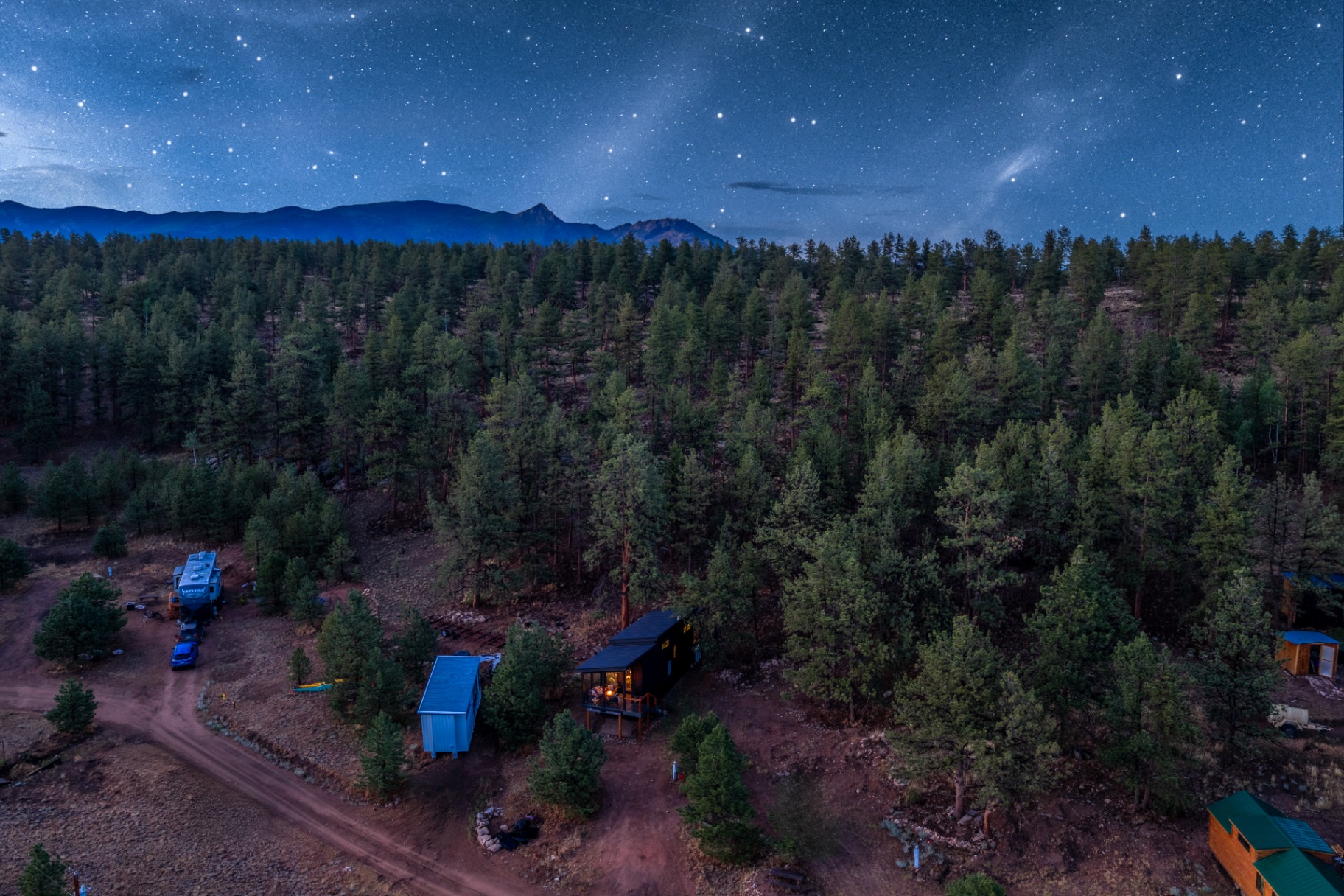 La Casa Noche tiny house at M Lazy C Ranch under a starry night sky